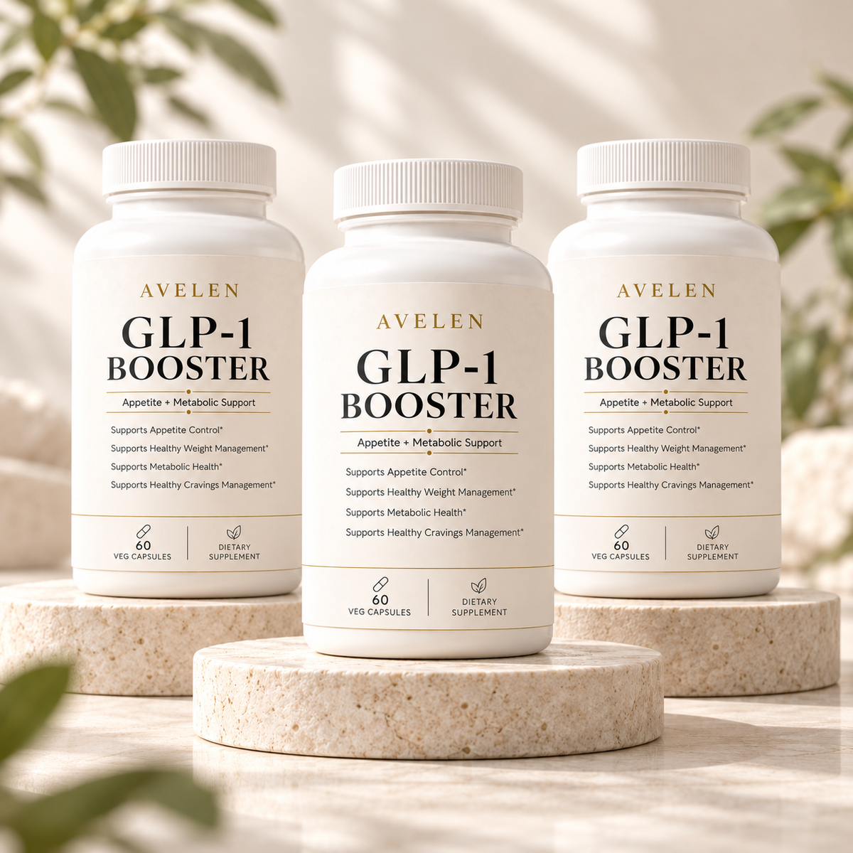 Three AVELEN GLP-1 Booster bottles on ivory stone plinths